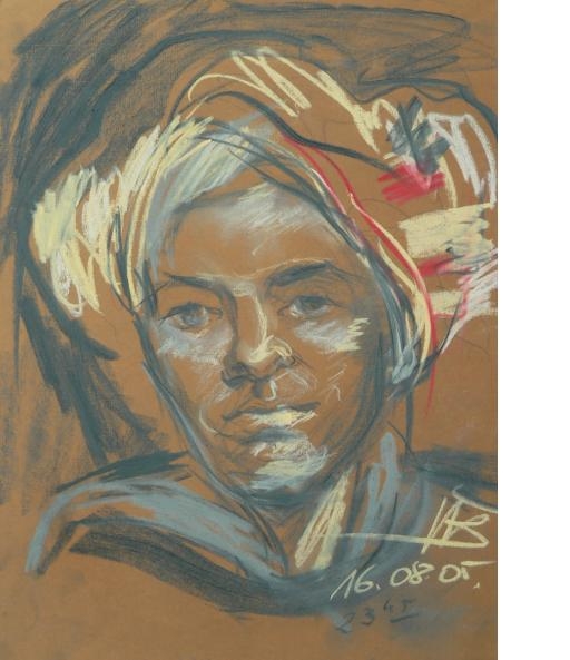 Kobieta z chustą na głowie